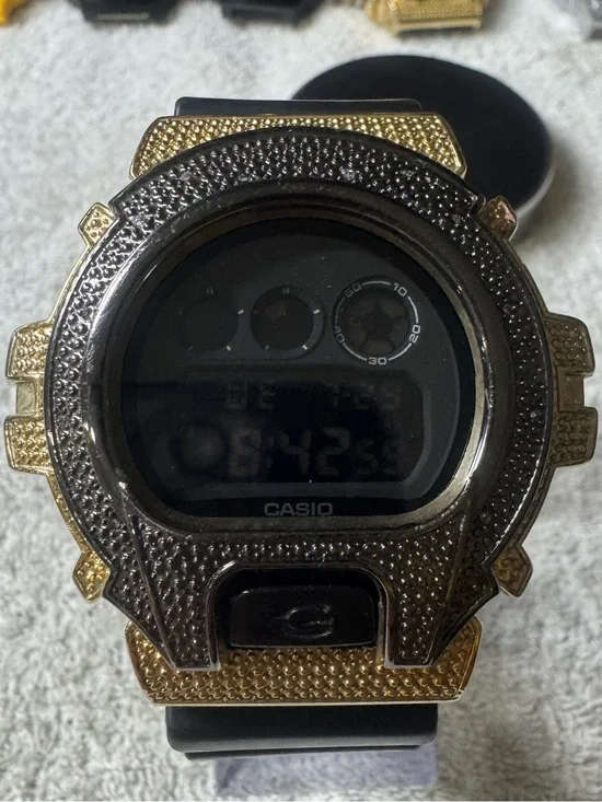 Casio Digital Watch with Black Strap and Gold-Tone Bezel