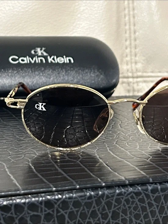 Calvin Klein Vintage 1990’s Oval Sunglasses With black lens and cK Logo