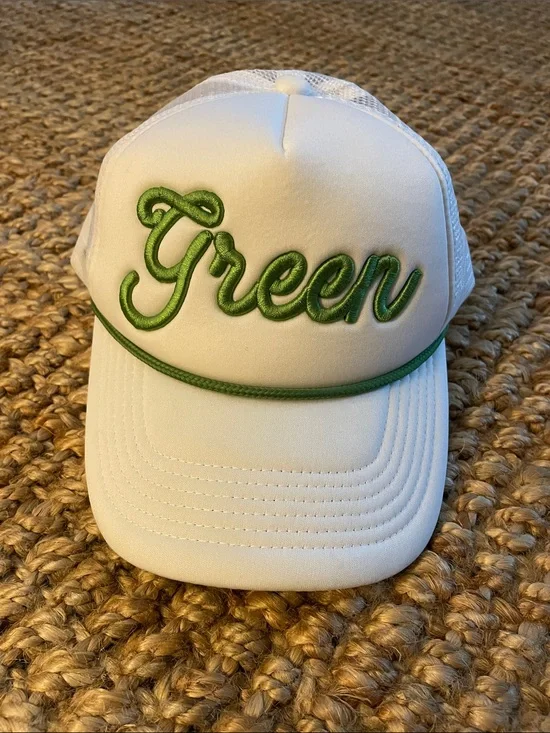 White Trucker Hat with Green Script Accent