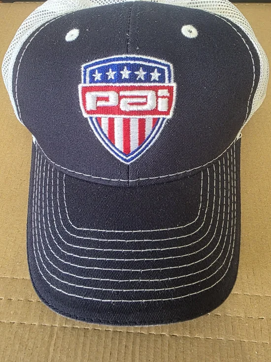 PAI Shield Trucker Hat - Navy with Red, White & Blue Patch