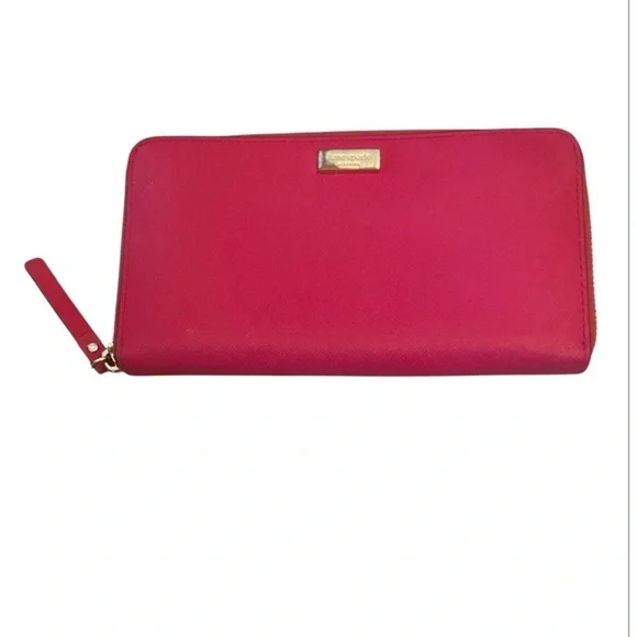 Kate Spade Newbury Lane Neda Wallet in Bougainvillea (pink).