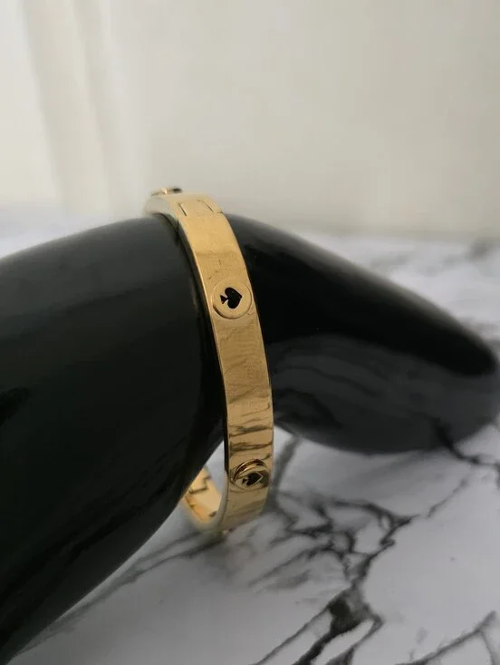 kate spade Gold-tone Logo Screw Bangle Bracelet