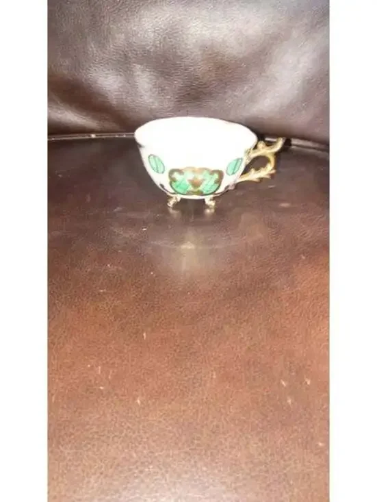 Weird Green cat teacup