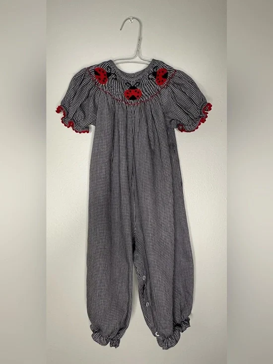 Smockadot Kids 9 month size with ladybug smocking with snap crotch .