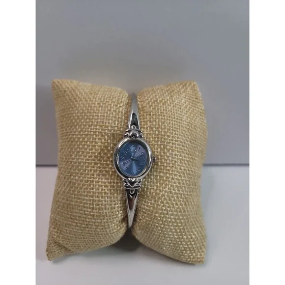 Vintage Gloria Vanderbilt Women's Watch Blue Dial Silver Tone Scroll Bracelet