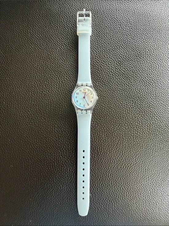 Light Blue Silicone Swatch Watch with opalescent face Like new with new battery