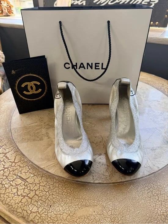 CHANEL Silver Leather Ballet Flats with Black Cap Toe