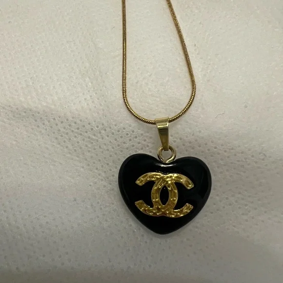 CHANEL Black Heart Pendant Necklace with Gold CC Emblem