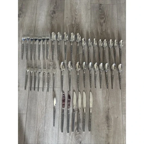 UNF 1110 Stainless Flatware Set Japan Scroll Oak or Maple Leaf Black Accent 44pc