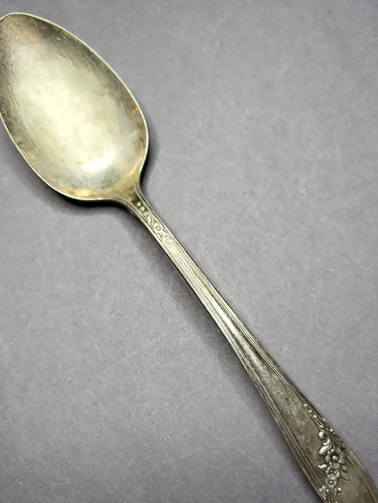 Oneida Silver Floral Handle Spoon