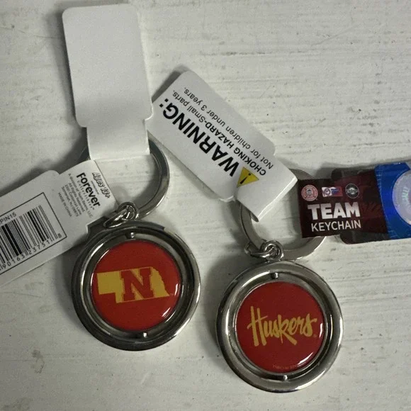 NFL Nebraska Cornhuskers Spinning Logo Key‎ Ring Keychain Forever NE Huskers