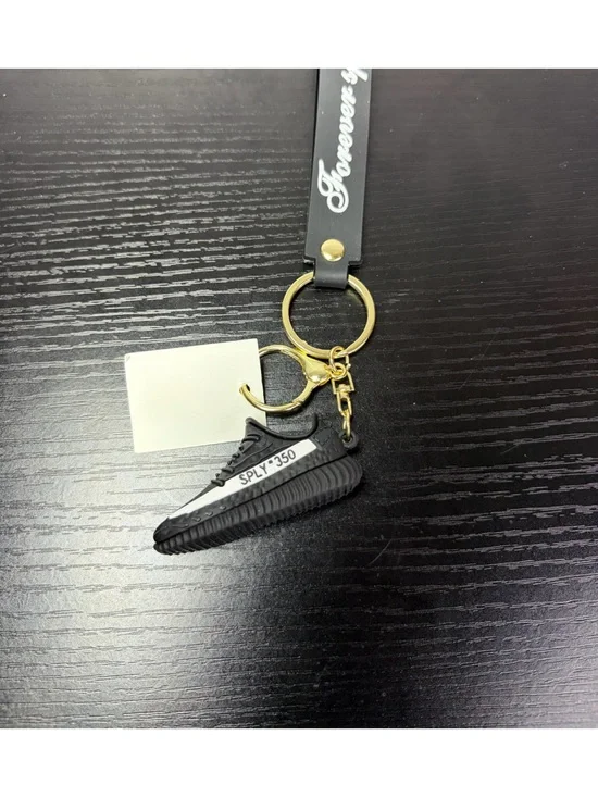 Black Keychain with Gold Hardware and Sneaker Charm