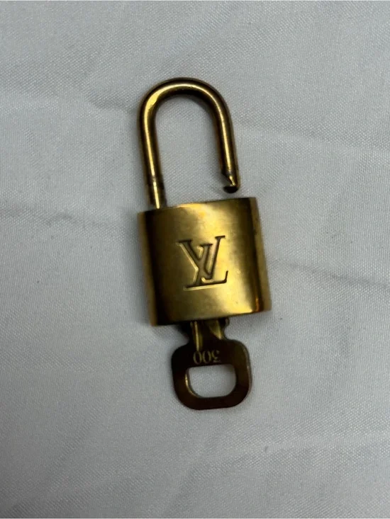 Louis Vuitton Gold Tone Monogram Padlock with Key # 300