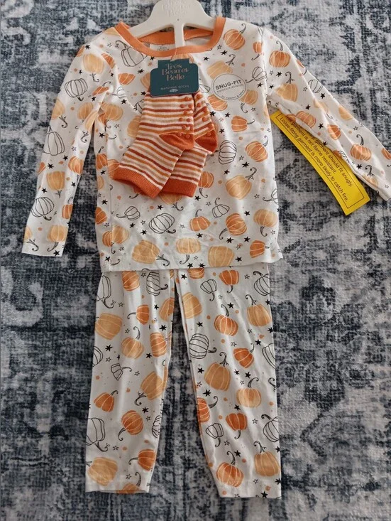 Tipsy Elves Kids Pumpkin Print Pajama Set with Orange Stripe Socks