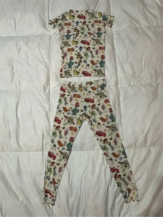 Little Sleepies Cream Pajama Set with Multicolor Toy Print