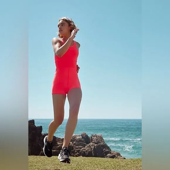 Free People Movement Every Single Time Runsie Athletic Romper Stretch Coral