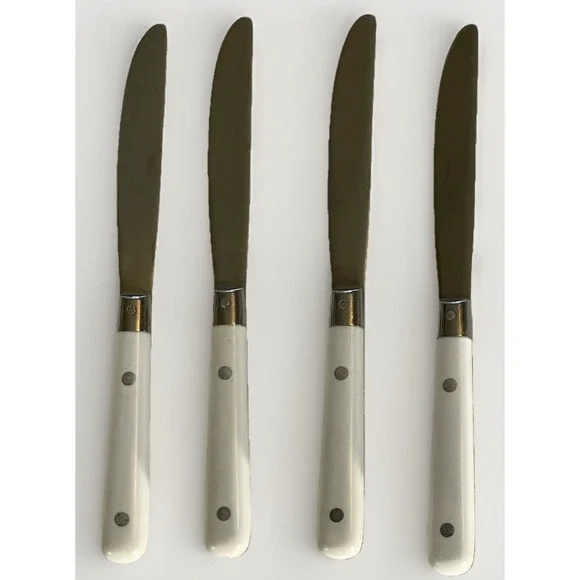 4 Carnival White Handle Dinner Knives Stainless Flatware Korea 3‎ Rivets