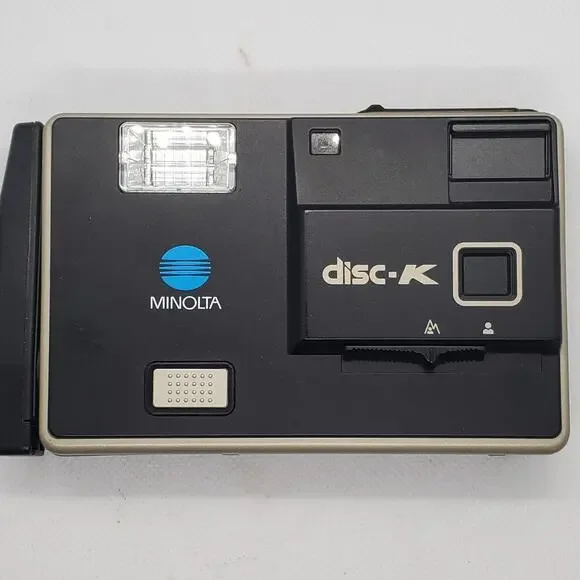 Vintage Minolta Disc-K Camera Black with 1 Kodak VR Disc Film Sealed Cartridge