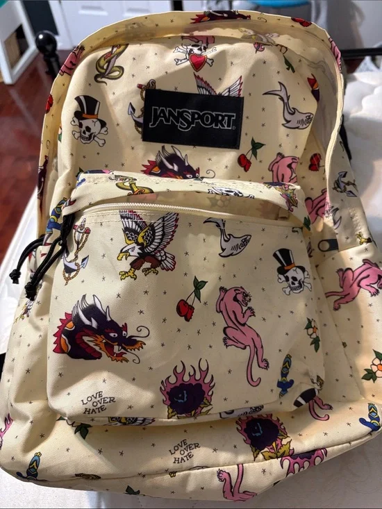 Jansport Cream Backpack with Tattoo-Style Prints