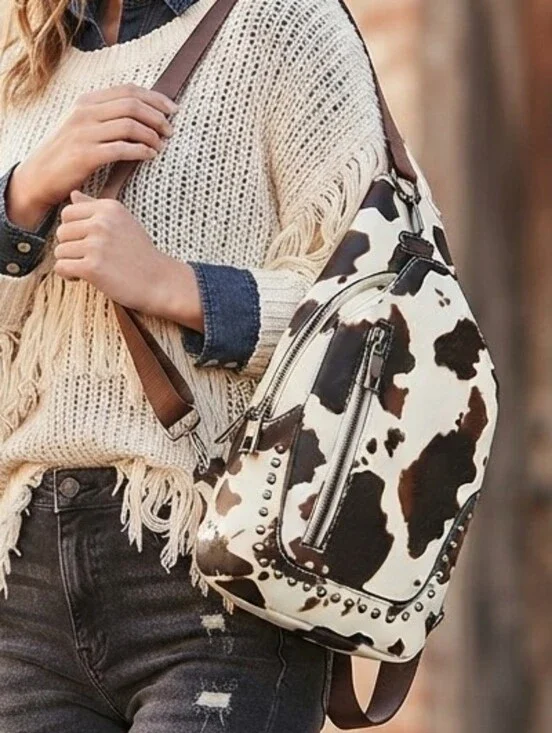 NWOT Sam & Hadley Western Cowhide Print Studded Sling Backpack - Hands-Free