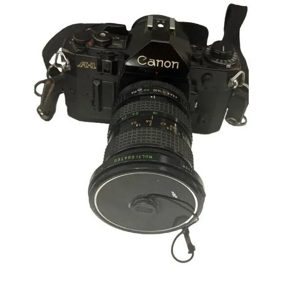Canon A-1 35mm Film Camera with toyo optics 28mm 1:3.5 Lens and F=28-80  Tested