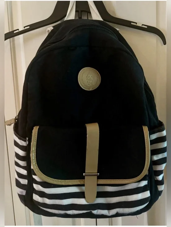The Idyll Of Collie And Golden Retriever Black Striped Backpack
