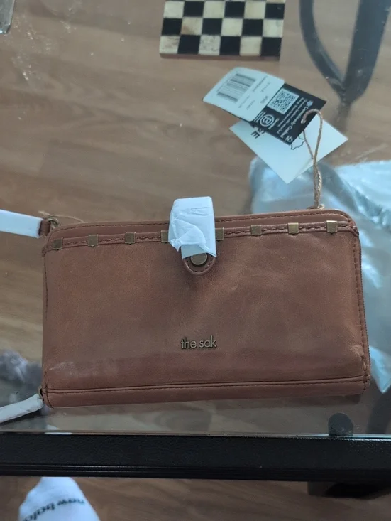The Sak Tan Leather Wristlet Wallet with Brass Accents