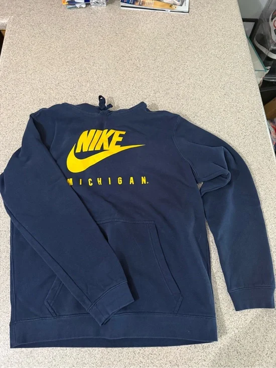 Nike Men’s Navy Hoodie with Yellow Nike Swoosh & Michigan Text