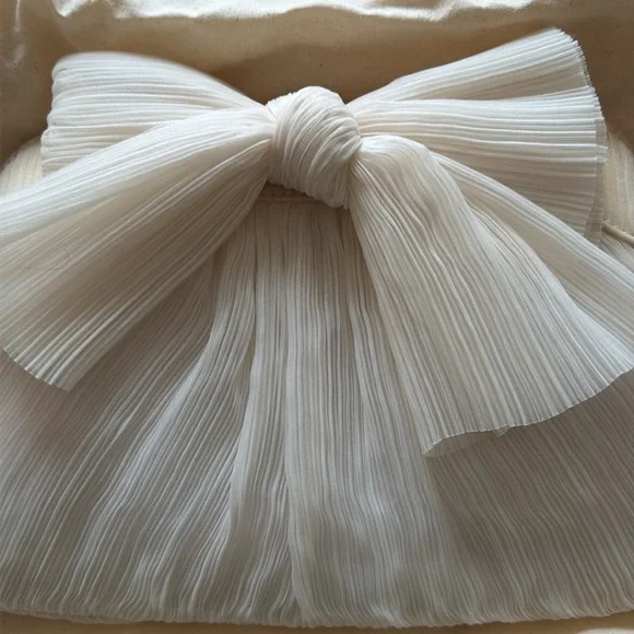 Rayne Pearl Bow Clutch