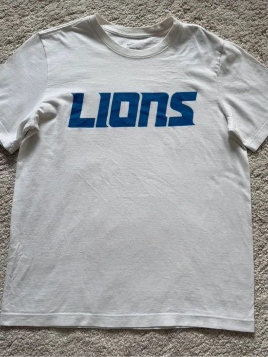 Nike White Short-Sleeve 'LIONS' Graphic Tee with Blue Logo