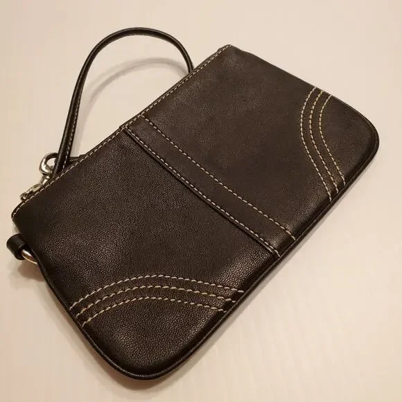 Black leather coach wristlet. Pre-owned, perfect shape. Size 6.5