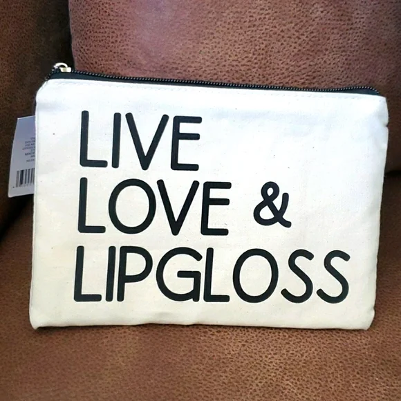 Live Love & Lipgloss newsprint makeup bag