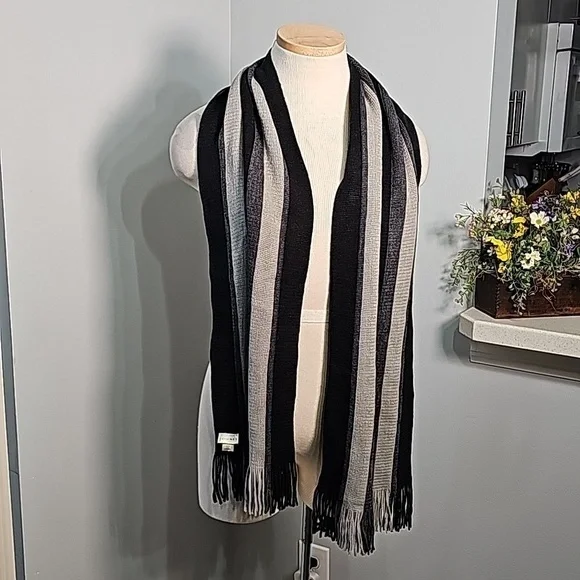Scarf gray and black striped with fringe. By Fownes 💯% acrylic. 10