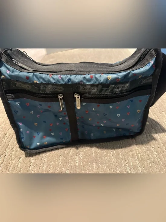Lesportsac Teal w hearts cross body bag