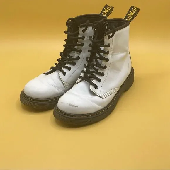 Dr. Martens White Boots with Lace-Up Design and Thick Rubber Sole‎