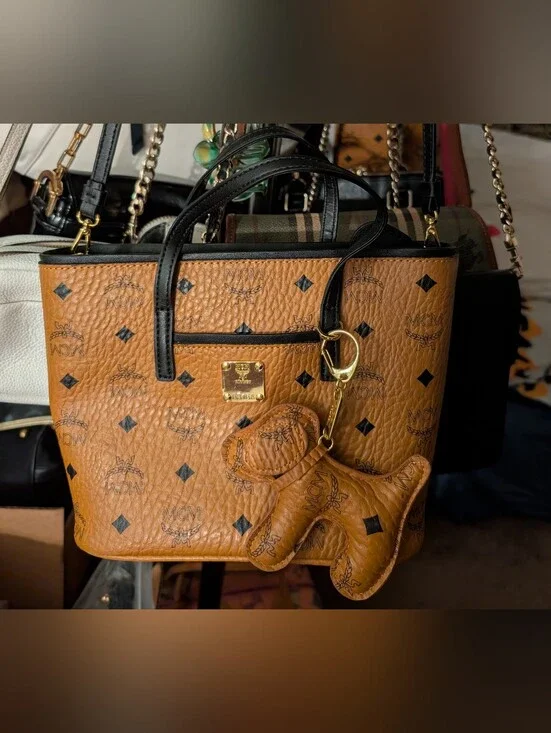 MCM Visetos Cognac Leather Mini Tote with Black Trim And Adorable Doggie Charm!
