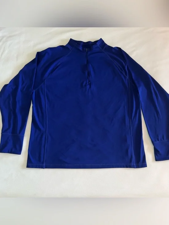 The North Face men's XL long sleeved thick dri-fit top in royal blue. EUC.