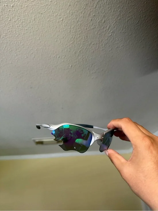 Silver Frame Sunglasses with Iridescent Green Lenses Oakleys