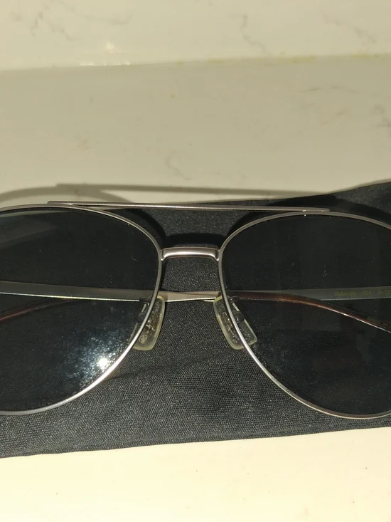 Dunhill Aviator Sunglasses showcases a classic double-bridge metal frame paired