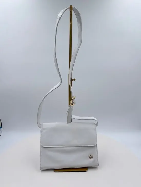 Ettienne white crossbody with wallet, makeup purse, detachable key ring and more