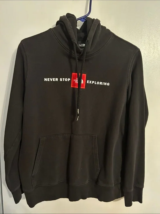 The North Face Black Hoodie with Red Logo Patch