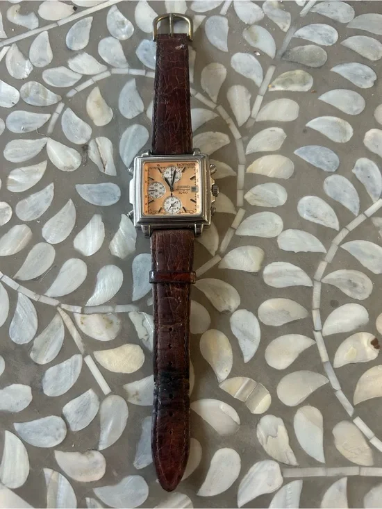 Seiko SQ 100 vintage watch with brown leather band