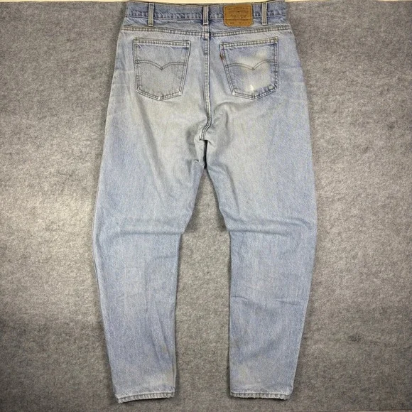 Vintage 90s Levis 550 Orange Tab Jeans Light Wash Relaxed Tapered Made in USA 38