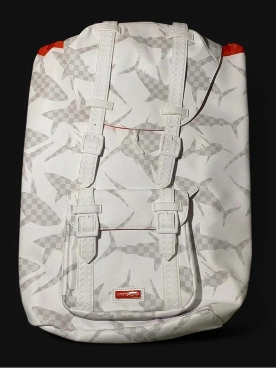 Sprayground White Shark-Pattern Buckle Backpack with Orange Accents