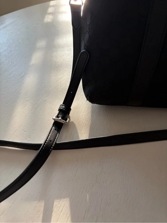 Gucci Black GG Charm Dome Satchel featuring silver-tone hardware