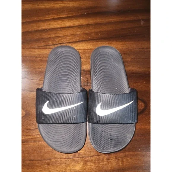 Nike Kawa slides Black with logo swoosh. Kids size 13C