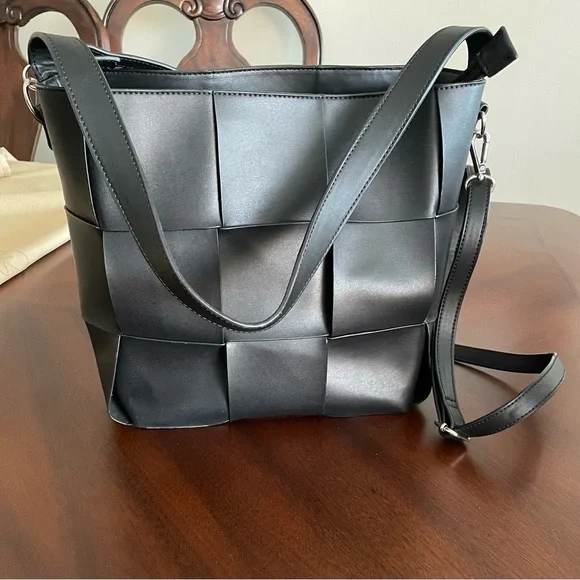 Expression NYC women’s black large wowen pattern Foux leather shoulder bag.