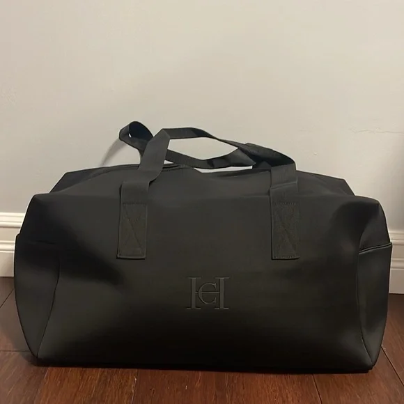 Carolina Herrera bad boy top handle weekend bag