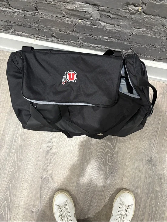 Under Armour Black Duffel Bag with Red University Patch