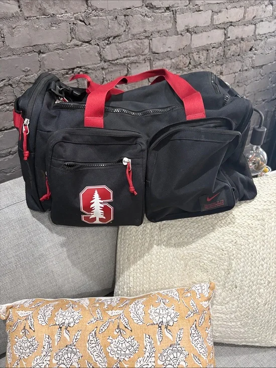 Nike Black Duffel Bag with Red Accents and Stanford Logo